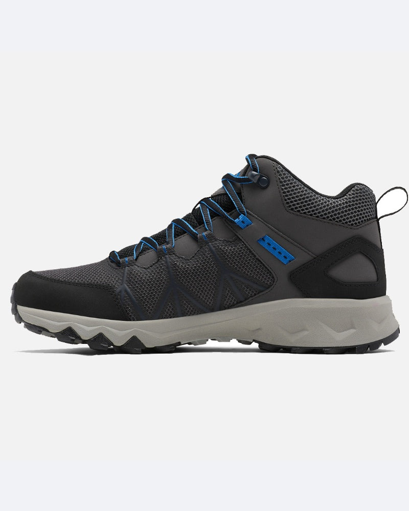 דגם ColumbiaIL Peakfreak II Mid Outdry — נעל טיולים בצבעי אפור ושחור עם נגיעות כחולות, סוליה עמידה, רשת נושמת ושרוכים כחולים — מוצגת בפרופיל צדדי על רקע לבן, והיא אידיאלית לחובבי פעילויות בחיק הטבע.