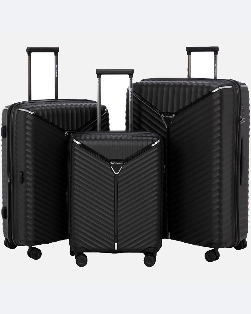 שלוש מזוודות קשיחות מדגם Oakland Black של חברת ColumbiaIL, בגדלים שונים, עם גימור פסים אלכסוניים, ידיות טלסקופיות וארבע גלגלים, מסודרות זו לצד זו על רקע אחיד.