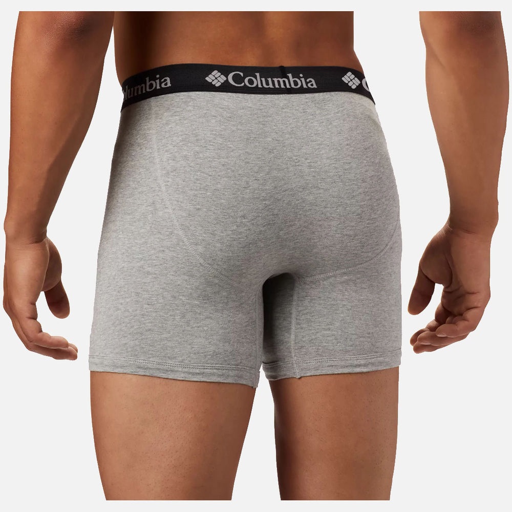 אדם המוצג מאחור לובש תחתוני בוקסר של ColumbiaIL Poly Stretch (2 יח' במארז) בצבע אפור בהיר, העשויים מבד פוליאסטר נמתח ומאוורר, עם חגורה שחורה ועליה לוגו לבן של ColumbiaIL.