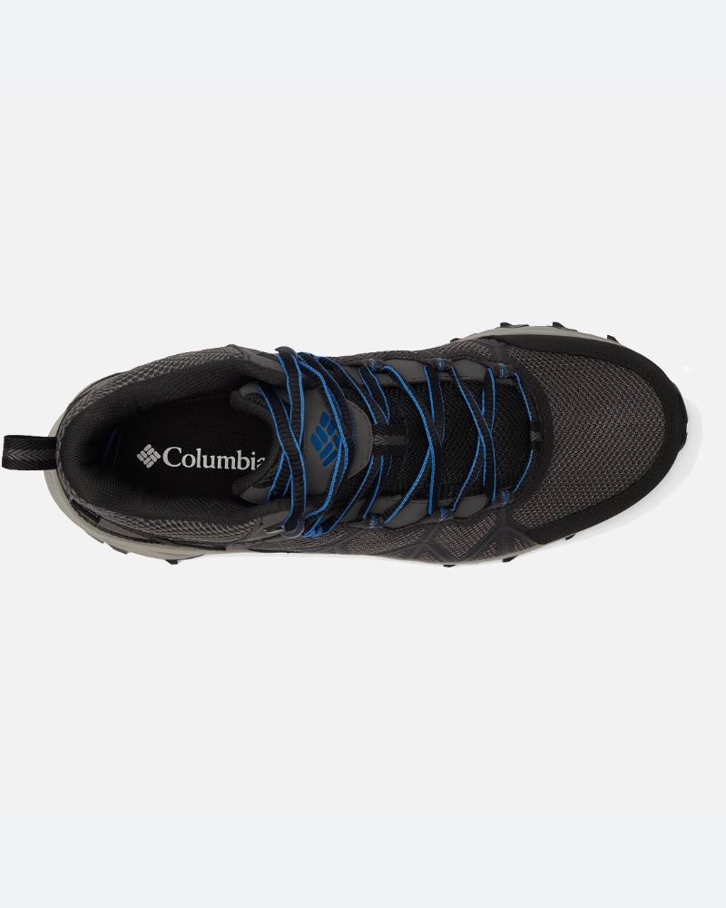 מבט מלמעלה על נעלי ספורט אפורות מדגם Columbia IL Peakfreak II Mid Outdry עם שרוכים כחולים וסוליה שחורה, ולוגו המותג על רפידת הנעל — הנעליים המושלמות לפעילויות בשטח לקראת ההרפתקה הבאה שלכם.