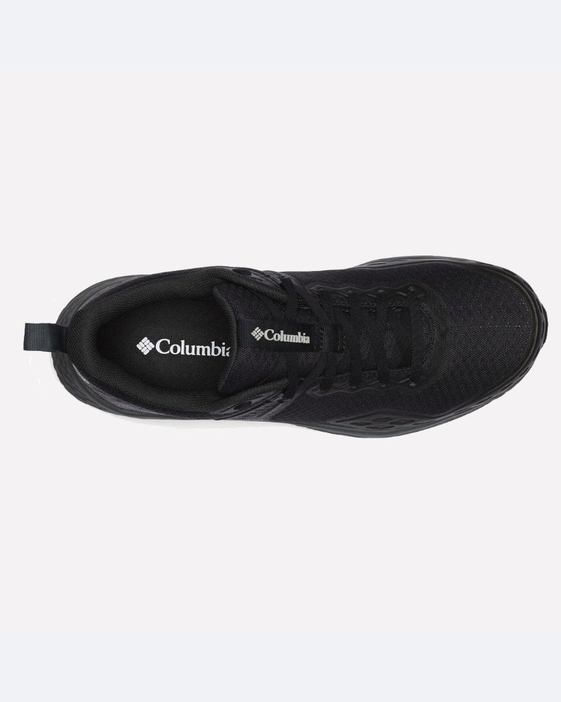 מבט מלמעלה על נעל טיולים שחורה מדגם Konos TRS Outdry II של ColumbiaIL, עם שרוכים שחורים, חלק עליון מרשת, לשונית משיכה בעקב ולוגו OUTDRY על רפידת הנעל — המספקת הגנה אטומה למים להרפתקאות בטבע.