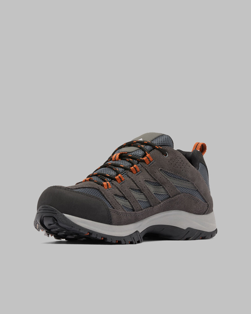 נעלי הטיולים לגברים מדגם "Crestwood Waterproof M" של ColumbiaIL, בצבעים אפור ושחור עם נגיעות כתומות ושרוכים כתומים, פרטים מרשת וסוליה עמידה, מוצגות על רקע אפור — אידיאליות למי שמחפש נעלי טיולים אטומות למים ואמינות.