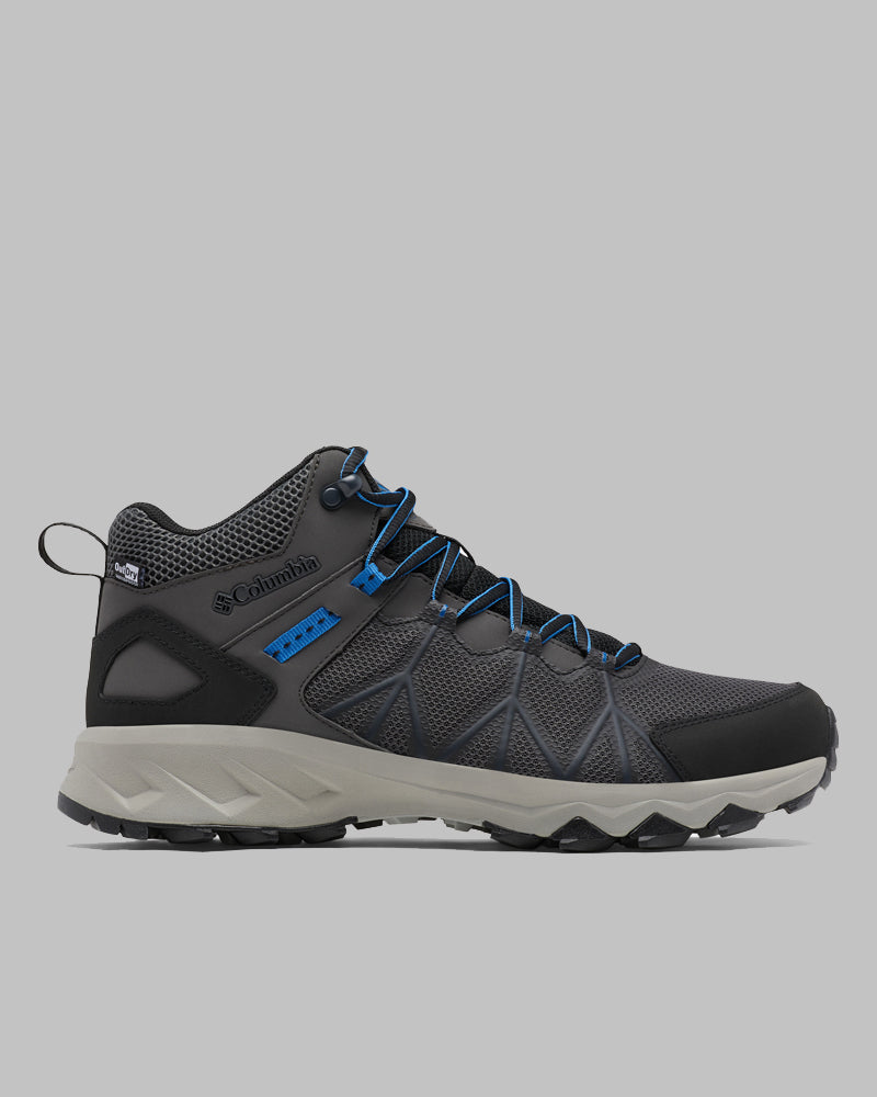 מגף טיולים לגברים מדגם Columbia IL Peakfreak II Mid Outdry M בצבעי שחור ואפור, עם נגיעות כחולות, פרטי רשת, שרוכים כחולים ושחורים, לשונית אחיזה בעקב וסוליה חזקה בצבע בז', מוצג בצילום צדדי על רקע אפור אחיד.