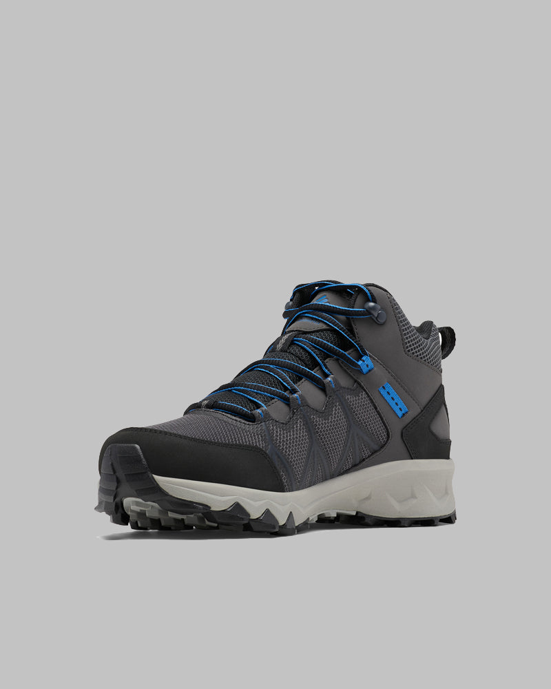 מגפי הטיולים לגברים ColumbiaIL Peakfreak II Mid Outdry M מתאפיינים בעיצוב בצבעים אפור ושחור עם שרוכים כחולים, סוליה מחוספסת, ורשתות עמידות וחיפויים סינתטיים, המוצגים על רקע אפור בהיר.